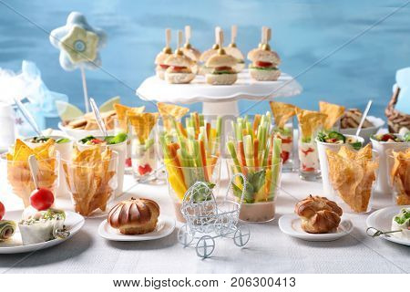 Tasty food for baby shower party on table
