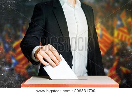 Man Voter Putting A Ballot Into A Voting box. Democracy Freedom Concept
