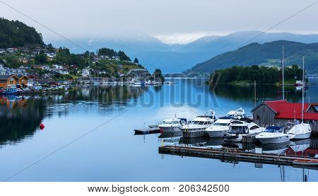 Cloudy summer view of Hardangerfjord