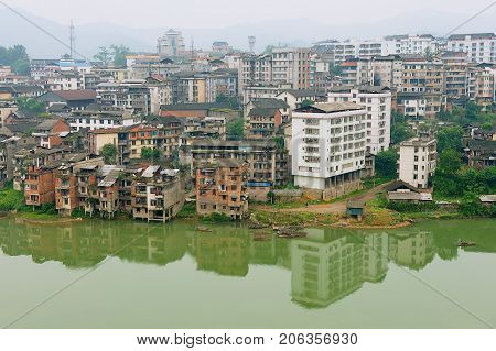 RONGSHUI, CHINA - MAY 07, 2009: View to the town of Rongshui in Guangxi across the river in Rongshui, China.