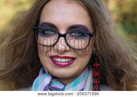 Portrait Of A Girl With Bright Make-up.