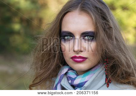 Portrait Of A Girl With Bright Make-up.