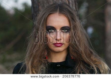 Portrait Of A Girl With Bright Make-up.
