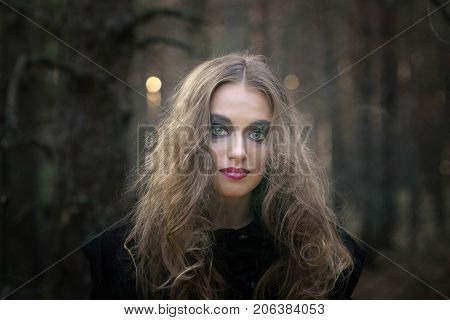 Portrait Of A Girl With Bright Make-up.