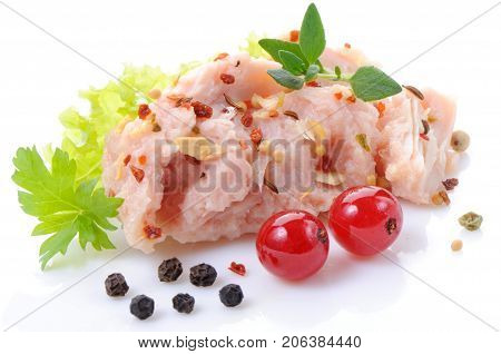 Pork stew with herbs on white background