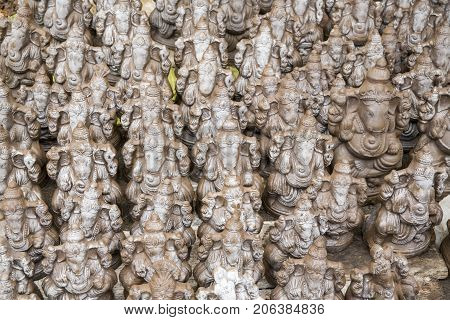 Many hand crafted Ganesha idol clay statues displayed in the market during Ganesh Festival.