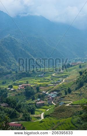 Spectacular View On Mountain Valley Village With Rice Terraces