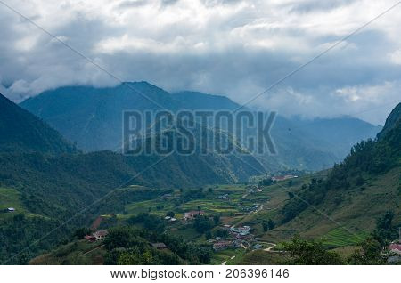 Mountain Valley With Villages And Rice Terraces