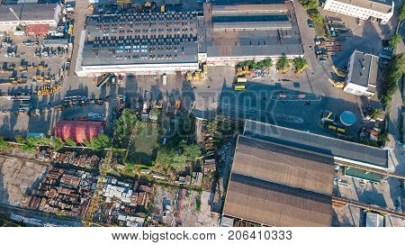 Aerial top view of industrial park zone from above, factory chimneys and warehouses, industry district in Kiev (Kyiv), Ukraine