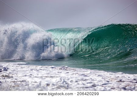 Powerful wave and surf on the coast of the ocean