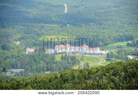 Mount Washington Hotel in summer, from summit of Mount Rosebrook, Bretton Woods, New Hampshire, USA. Now Mount Washington Hotel is registered as a National Historic Landmark.
