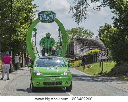 Sainte Marguerite sur Mer France - July 09 2015: Teisseire Caravan during the passing of Publicity Caravan before the stage 6 of Le Tour de France 2015 on 09 July 2015. Teisseire produces fruit juices and syrups for the food service industry.