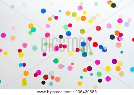 Festive party or carnival confetti on pink background