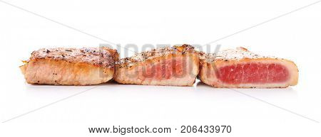 Tasty steaks on white background