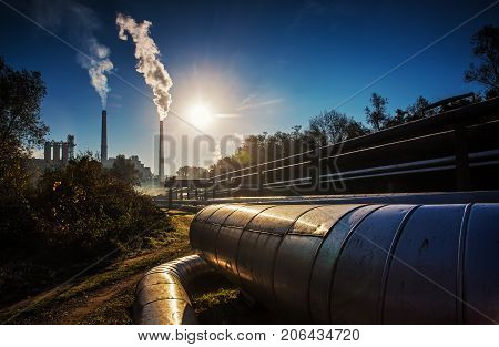 Power station with smoking chimney symbol of environmental pollution