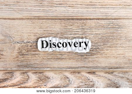Discovery text on paper. Word Discovery on torn paper. Concept Image.