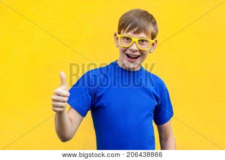 Success And Happiness Thumbs Up, Looking At Camera And Toothy Smile.