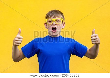 Happiness Thumbs Up, Looking At Camera And Toothy Smile.