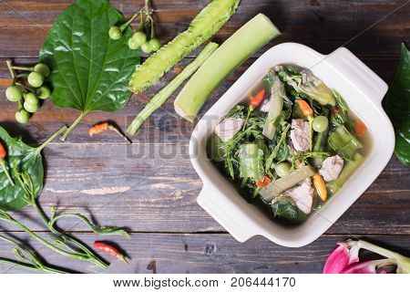 Northern Thai food (Kaeng Khae with pork),curry is made mainly with vegetables and herbs,main ingredients is Piper sarmentosum leaves.Top view of food