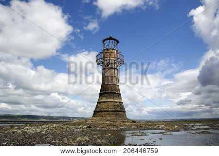 Whiteford Lighthouse is listed by Cadw as Grade II. A wave-swept cast-iron lighthouse in British coastal waters and an important work of cast-iron architecture and nineteenth-century architecture.