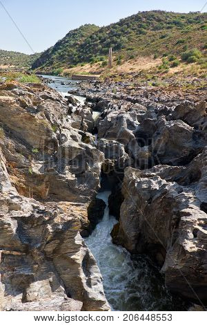 Pulo Do Lobo Or Wolf's Leap Waterfall And Cascade On River Guadiana, Alentejo, Portugal