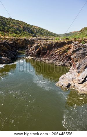 Pulo Do Lobo Or Wolf's Leap Waterfall And Cascade On River Guadiana, Alentejo, Portugal