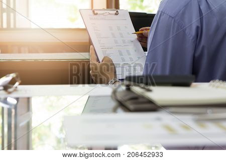 Business And Finance Concept Of Office Working, Businessmen Discussing Project Balance Sheet Analysi