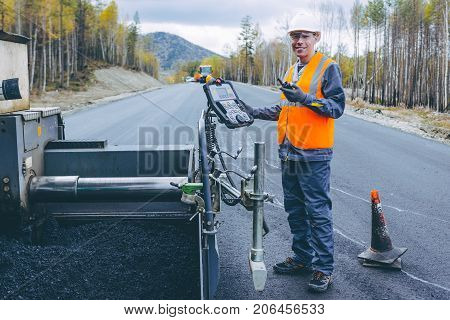 ashalting machine operator road construction maintenance repair