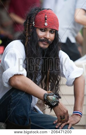 BANGKOK THAILAND - DECEMBER 22 2007 : The Chatuchak Weekend Market is the largest market in Thailand. A seller disguised as a Pirate jack sparrow
