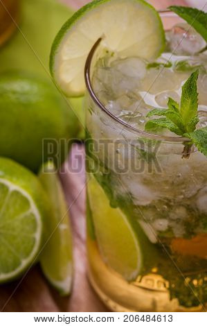 Mojito cocktail with glace on green lemon