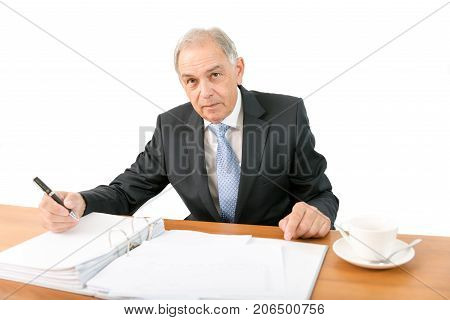 Man as an official, representative or reseller sitting at a desk