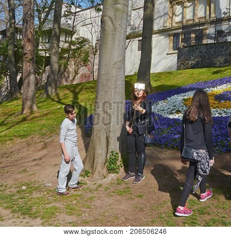 Istanbul Turkey - April 06 2016 Annual Spring Festival of Tulips new design Gulhane Park local people and tourists are getting rest making photos and enjoy good weather and spring slice of life editorial.
