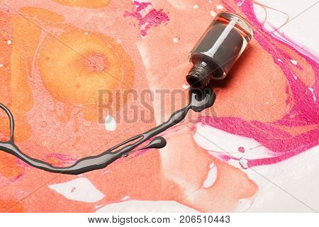 Bottle Of Nail Polish Without Cover. Paint In Brown Color