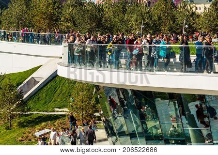 Moscow, Russia - September 23. 2017. Tourists on observation deck in a new park Zaryadye.