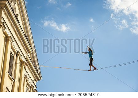 LUBLIN POLAND- 29 july 2017- slackliner in old town at Urban Highline Festival placed in city space of Lublin - biggest slacklining spectacle in the world