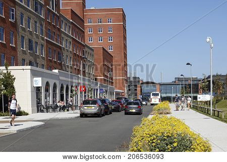 Swansea, UK: May 5, 2016: The Swansea Bay Campus is the home to the College of Engineering and School of Management. Students walk down the Main Street in Swansea Bay Campus.