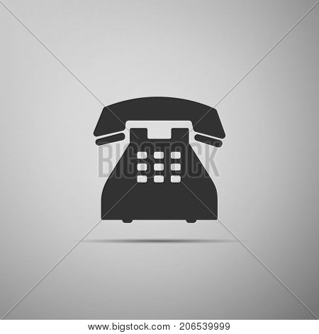 Telephone icon isolated on grey background. Landline phone. Flat design. Vector Illustration