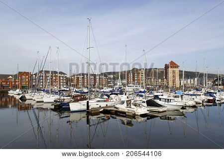 apartment, building, SA1, boats, city, community, day, harbor, home, ownership, lifestyles, landmark, marina, modern, moored, motor, neighborhood, outdoors, quay, quayside, residential, district, sail, swansea, uk, wales, waterfront, yacht, tourism,