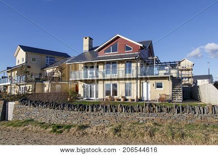Swansea, UK: March 31, 2016: A large, exlusive five bedroom individually designed family house. Prices of desirable detached houses in prime locations have escalated enormously in the last decade.
