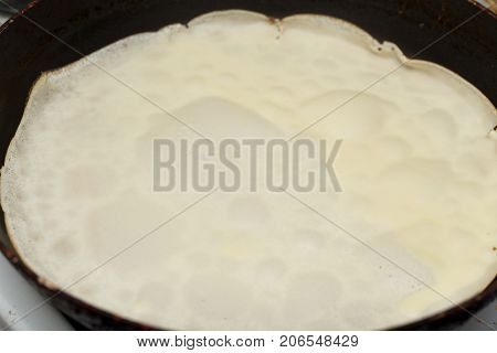 pancakes fried in a pan . Photos in the studio