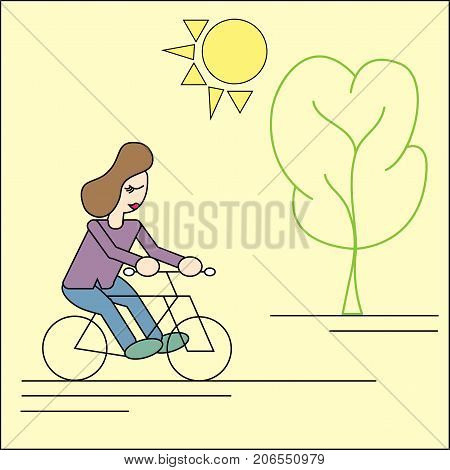 Cute girl riding bike in the park
