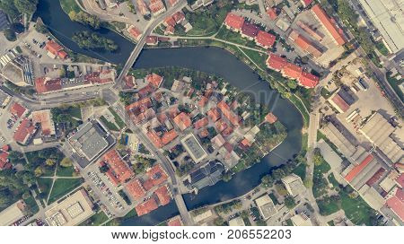Top view of a river bend running through town. Kocevje, Slovenia.