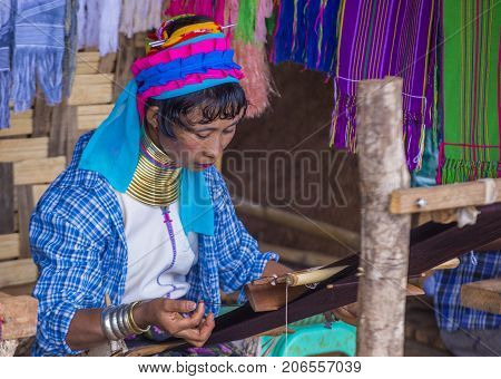 KAYAN STATE MYANMAR - SEP 09 : Portrait of Kayan tribe woman in Kayan state Myanmar on September 09 2017 Kayan tribe woman are well known for wearing neck rings.