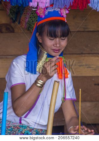 KAYAN STATE MYANMAR - SEP 09 : Portrait of Kayan tribe woman in Kayan state Myanmar on September 09 2017 Kayan tribe woman are well known for wearing neck rings.