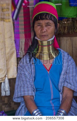 KAYAN STATE MYANMAR - SEP 09 : Portrait of Kayan tribe woman in Kayan state Myanmar on September 09 2017 Kayan tribe woman are well known for wearing neck rings.