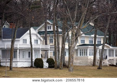 WEQUETONSING, MICHIGAN / UNITED STATES - MARCH 30, 2017: A view of lakefront homes on Beach Drive in Wequetonsing, Michigan, during March.