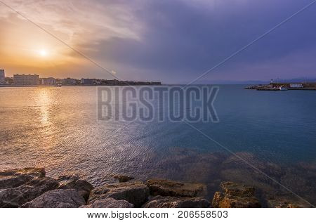 Sunset or blue hour in quiet port of l'Escala Costa Brava Spain. Mediterranean Sea