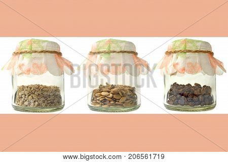 Vegetable and fruit seeds in glass bottle
