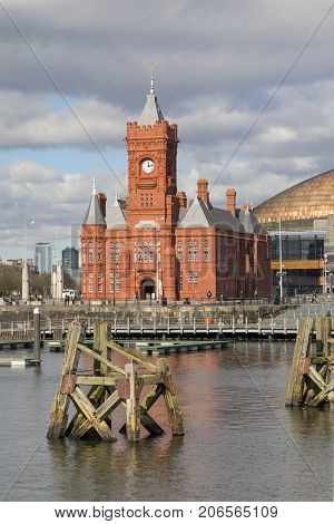 Cardiff, UK: March 10, 2016: The Pierhead Building is a Grade I listed building. It stands as one of the city of Cardiff's most familiar landmarks and was built in 1897 by the Bute Dock Company.