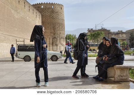 Fars Province Shiraz Iran - 19 april 2017: Iranian school girls are waiting for the beginning of the excursion to Karim Khan citadel.